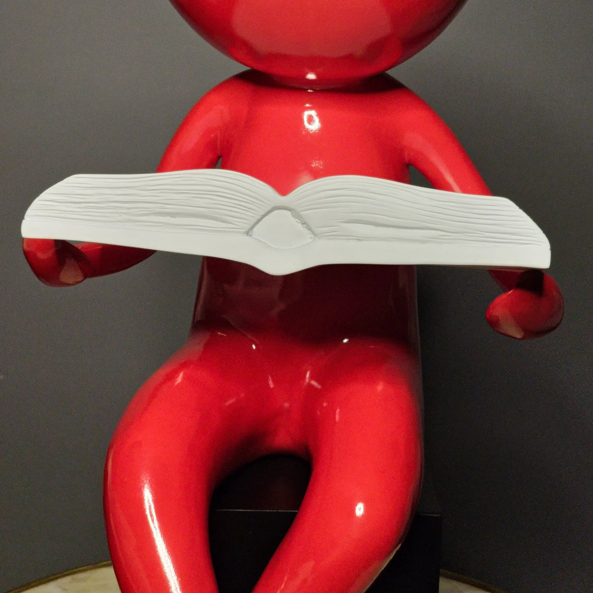 The Reading Men torso & book macro detail