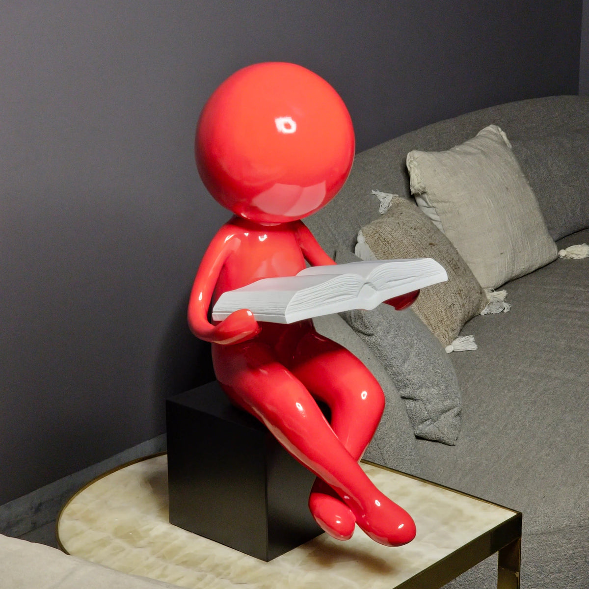 The Reading Men on marble side table