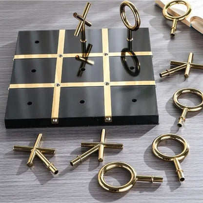 Tic Tac Toe scattered pieces, top-down flat-lay