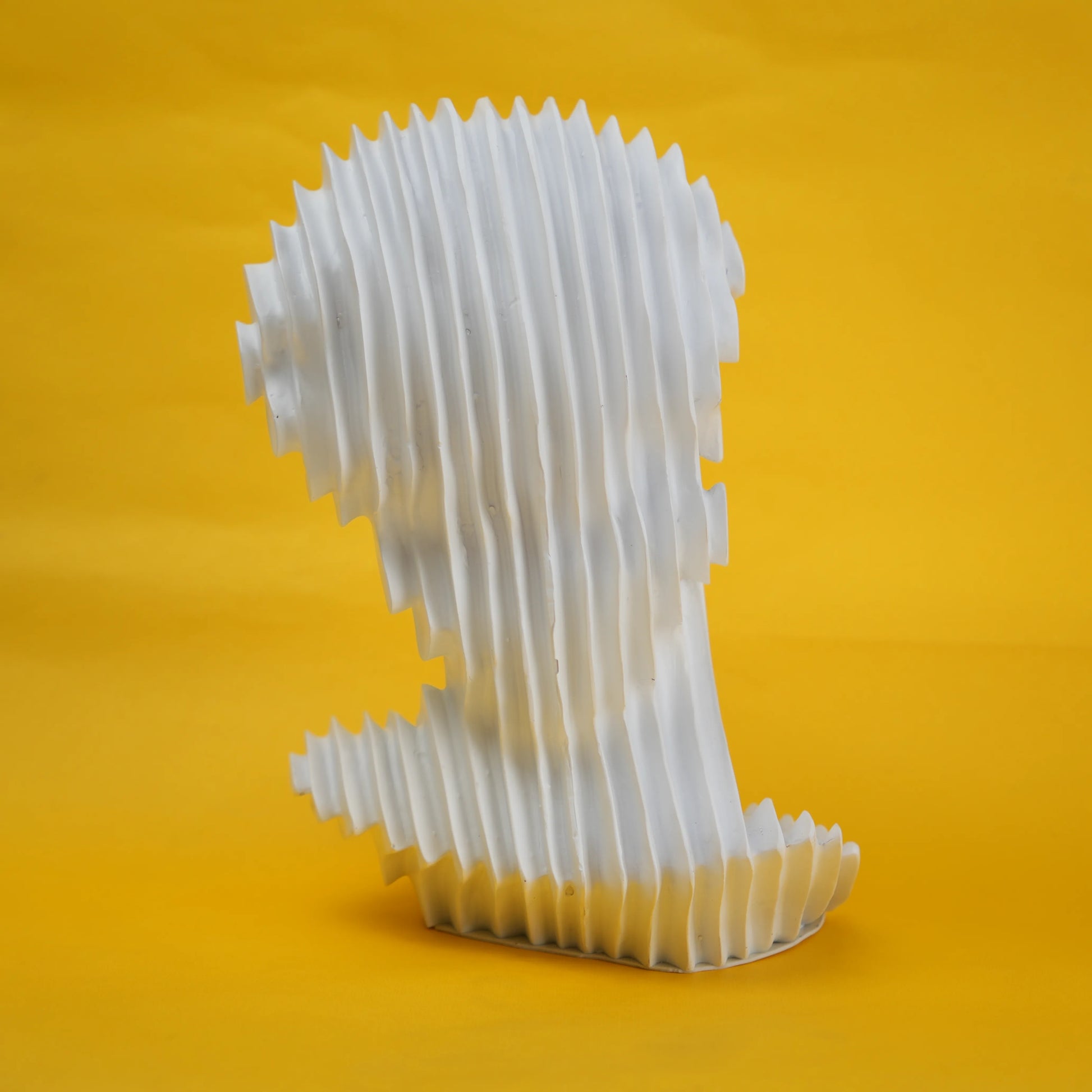 White pleated bust rear 3/4 on yellow