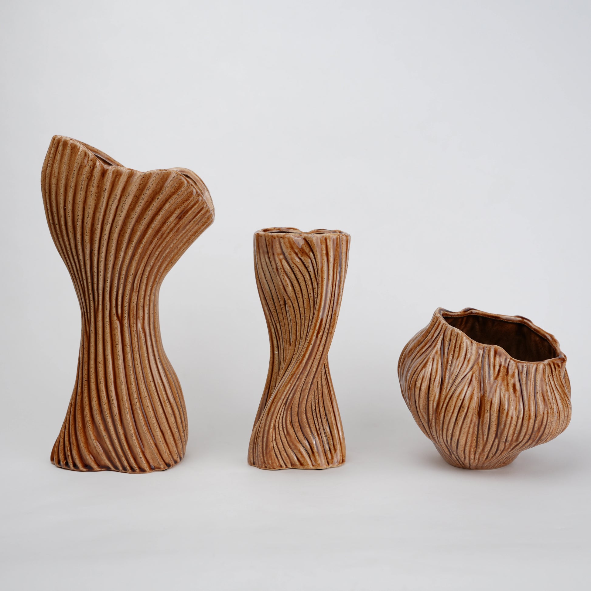 Brown textured ceramic vases with three unique shapes for modern rustic home decor styling