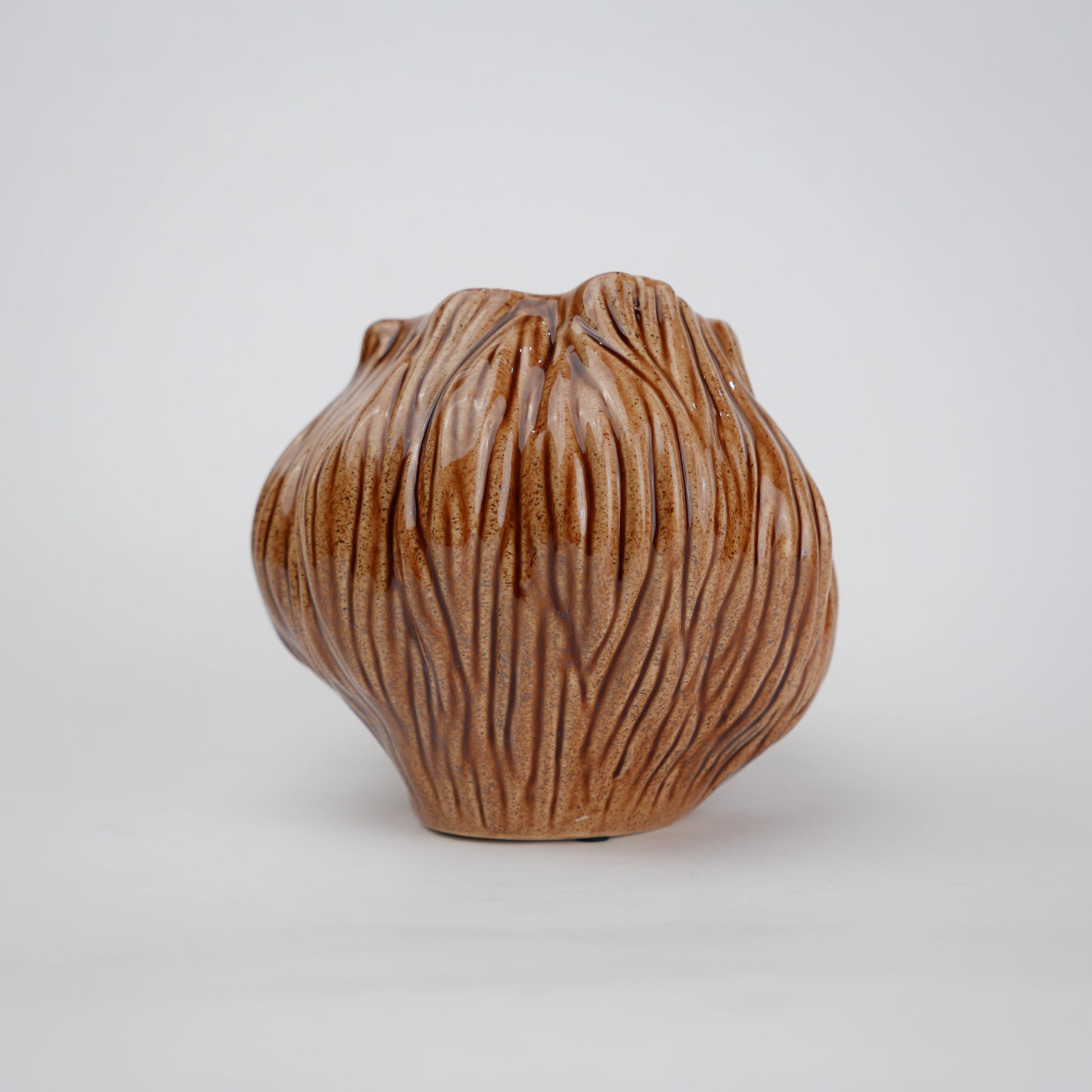 Brown textured ceramic vases with three unique shapes for modern rustic home decor styling