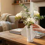 Organic Crest w/ freesia, hand reaching