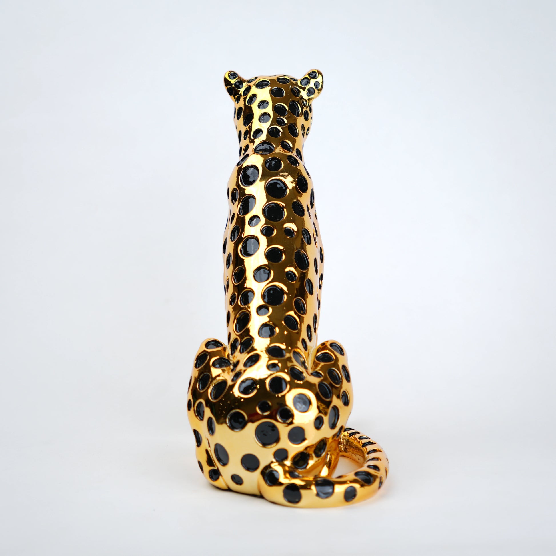 luxury leopard figurine in gold with black detailing modern decor