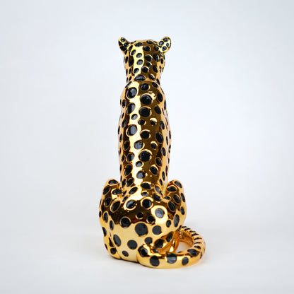 luxury leopard figurine in gold with black detailing modern decor
