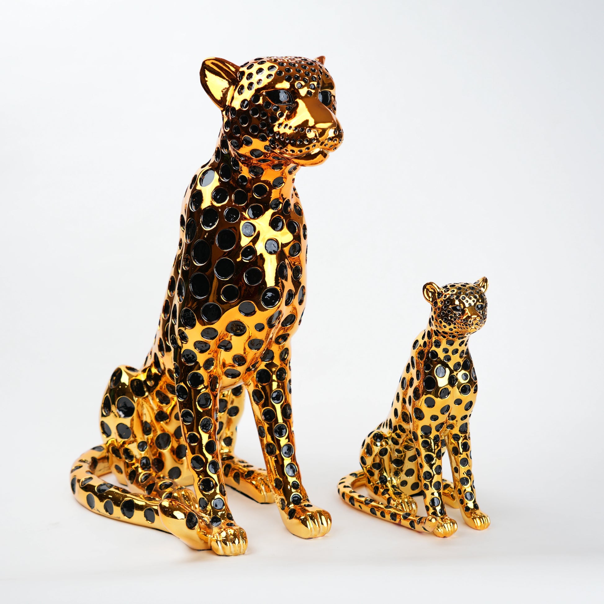 luxury leopard figurine in gold with black detailing modern decor