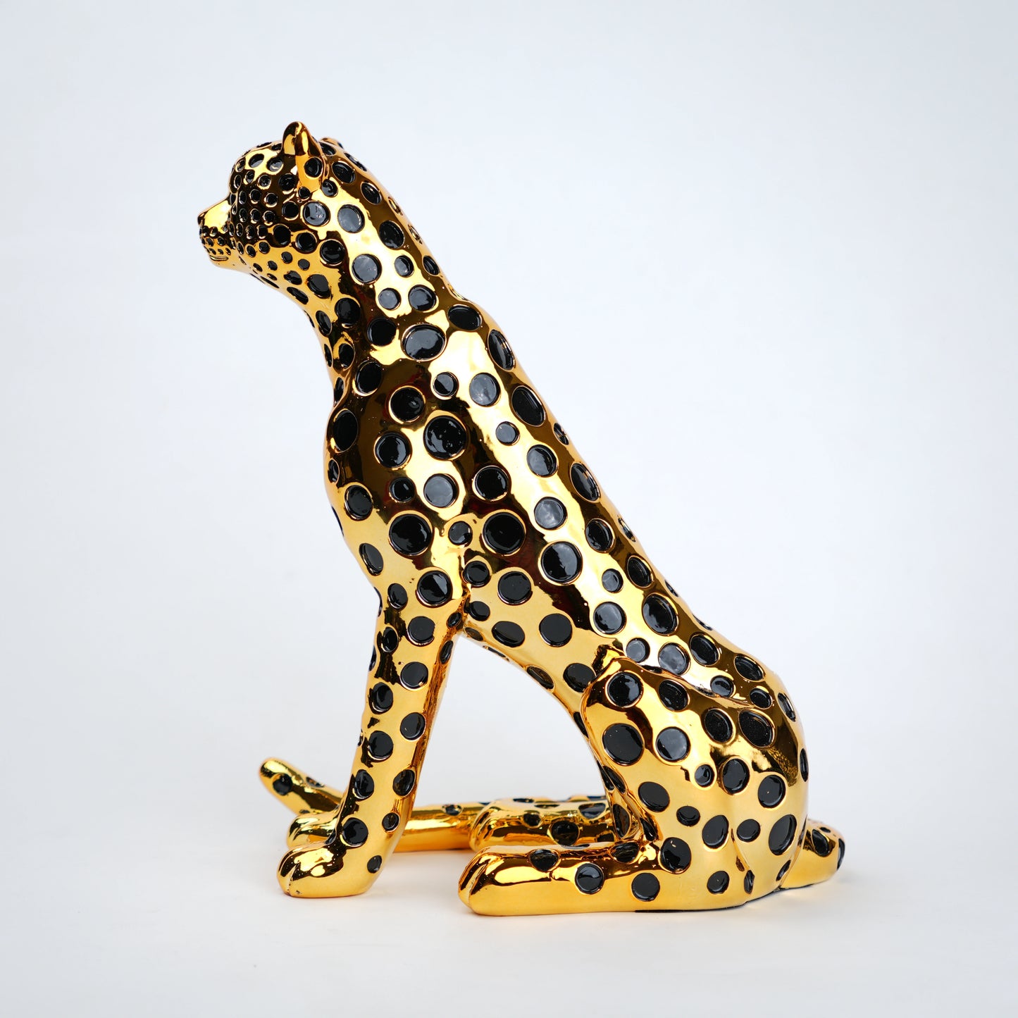 luxury leopard figurine in gold with black detailing modern decor