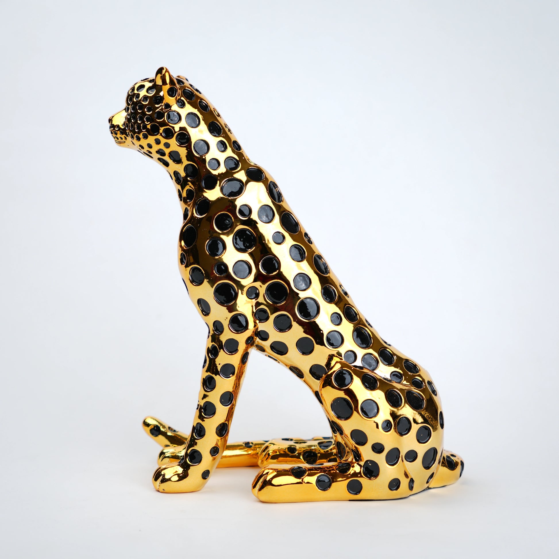 luxury leopard figurine in gold with black detailing modern decor