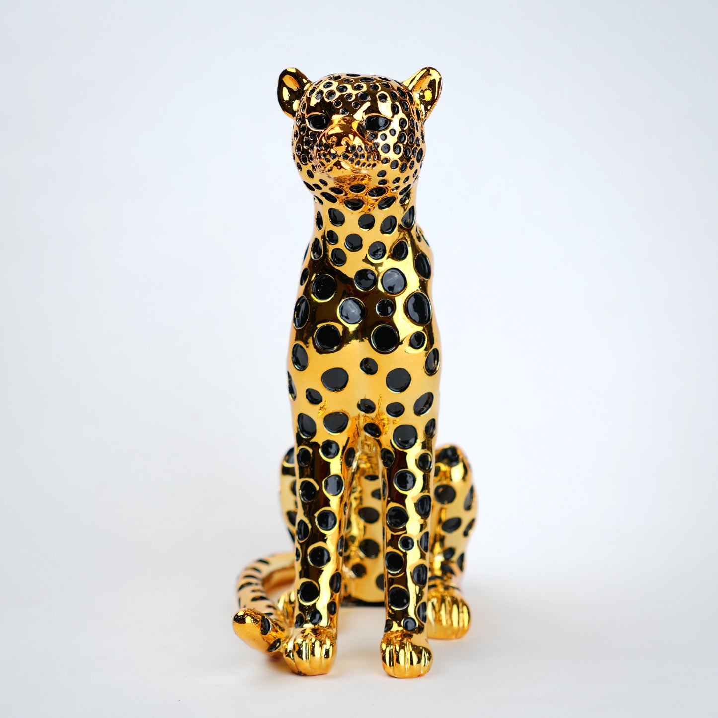 luxury leopard figurine in gold with black detailing modern decor