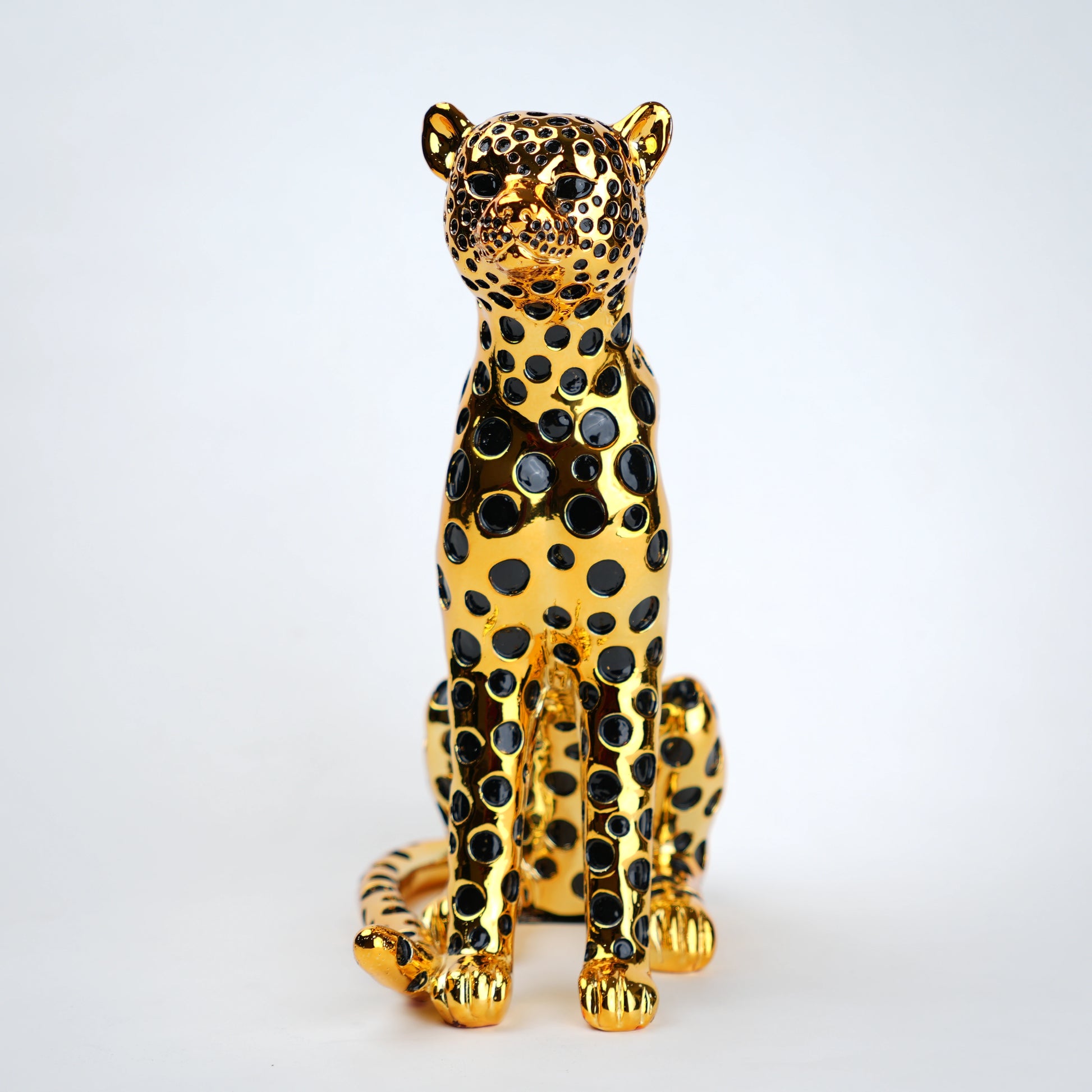 luxury leopard figurine in gold with black detailing modern decor
