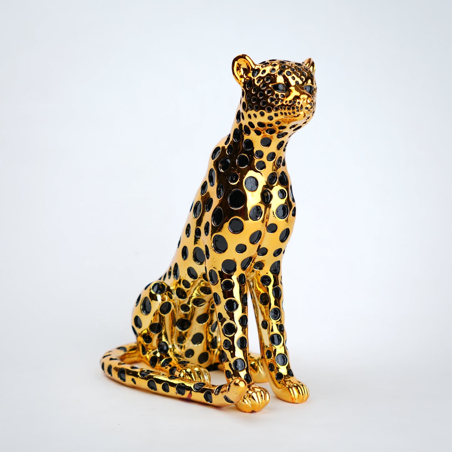 luxury leopard figurine in gold with black detailing modern decor