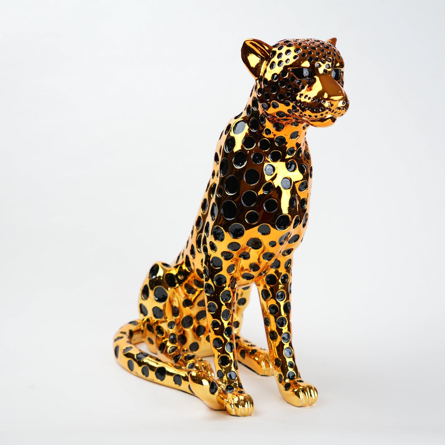 luxury leopard figurine in gold with black detailing modern decor