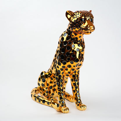 luxury leopard figurine in gold with black detailing modern decor