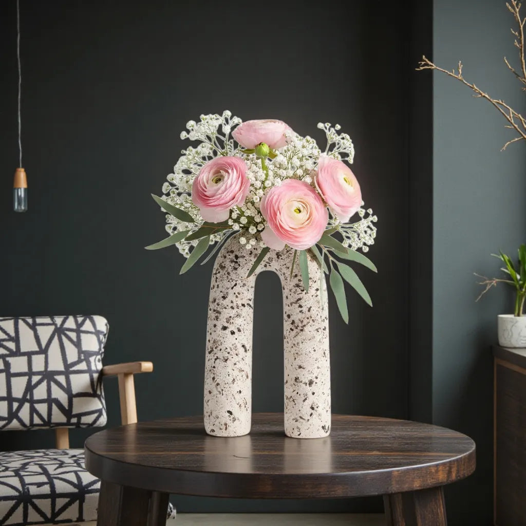 Terra Loop w/ pink ranunculus on dark wall