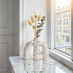 Terra Arch w/ eucalyptus on marble sill