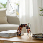 Glass cat tortoise amber on oak coffee table