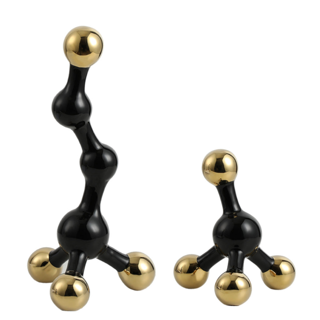 Black and gold abstract fusion form decor accent