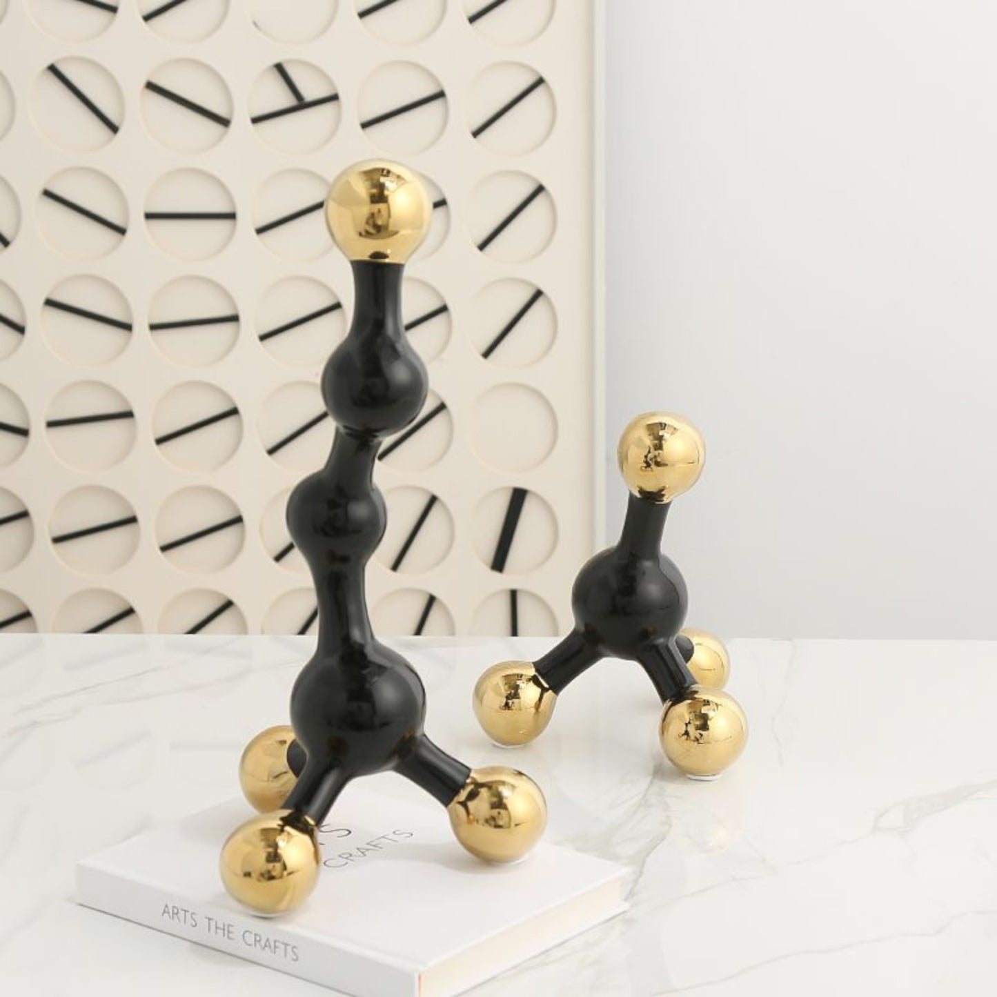 Black and gold abstract fusion form decor accent