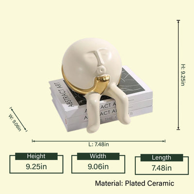 Regal Gaze: White & Gold Face Figurine