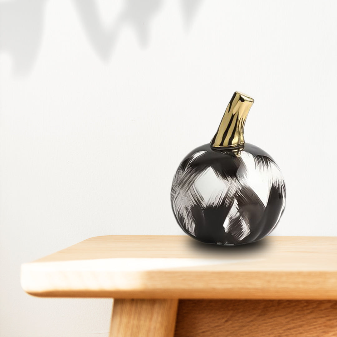IvoryLuxe pumpkin on light oak bench