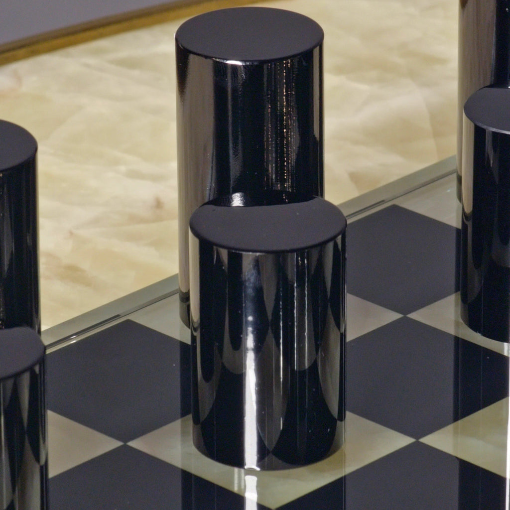 Sleek Glass Chess Set macro, black cylinders