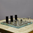 Sleek Glass Chess Set wide shot on onyx table