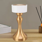 Luxury cordless LED table lamp featuring a brushed gold metal base with a minimalist white lampshade, ideal for bedside tables, restaurants, cafés, living rooms and modern designer interiors.