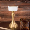 Luxury cordless LED table lamp featuring a brushed gold metal base with a minimalist white lampshade, ideal for bedside tables, restaurants, cafés, living rooms and modern designer interiors.