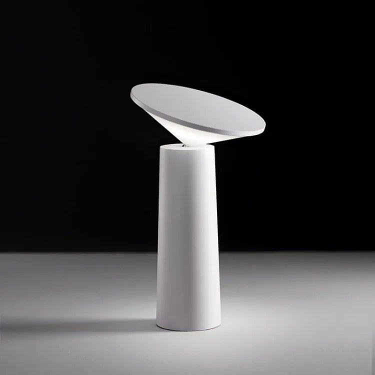 designer table lamp with sleek base and diffused lighting for interiors