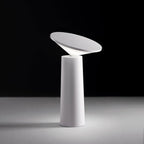 designer table lamp with sleek base and diffused lighting for interiors