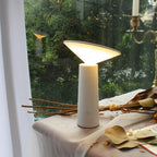 modern minimalist table lamp with soft ambient light for home decor