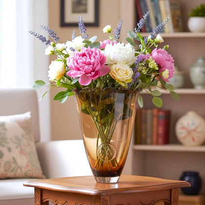 Brown bronze vase w/ peonies, side table