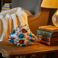 Coastal conch shell w/ books & lamp, lifestyle