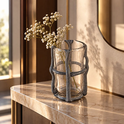 Tall ribbed cylinder vase on craft book