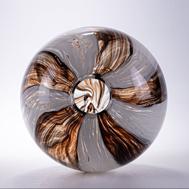 Radiant orb vase top-down, copper swirl
