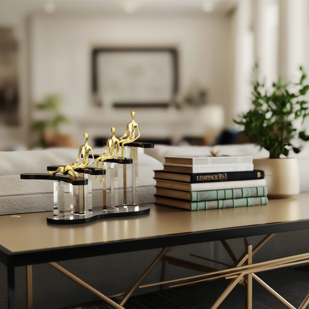 Ascend Form on bronze table w/ books & plant