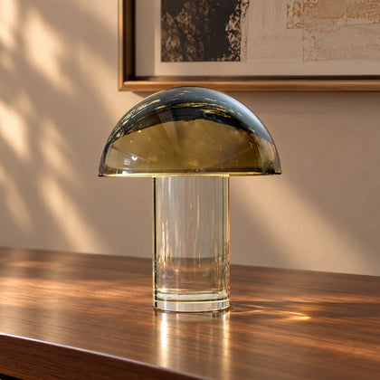 Luxury mushroom-inspired smoked glass décor accent featuring a tinted glass dome and clear cylindrical glass base, perfect for coffee tables, console tables, bookshelves and modern designer interiors.