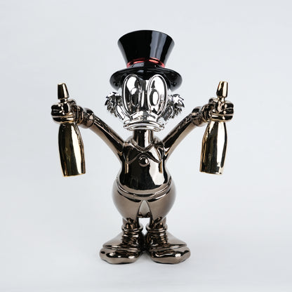 metallic duck figurine holding champagne bottles modern quirky home decor