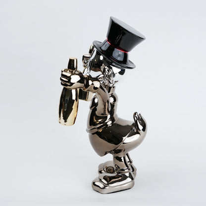 metallic duck figurine holding champagne bottles modern quirky home decor