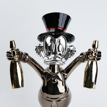 metallic duck figurine holding champagne bottles modern quirky home decor