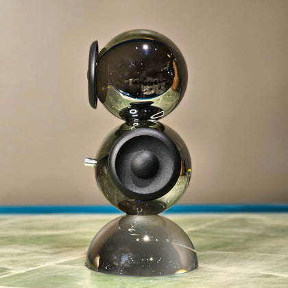 Modern speaker inspired decorative accent with glossy spherical detailing