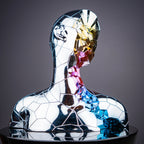 Modern prism face sculpture featuring chrome geometric detailing and vibrant artistic accents for elegant living room decor arrangements