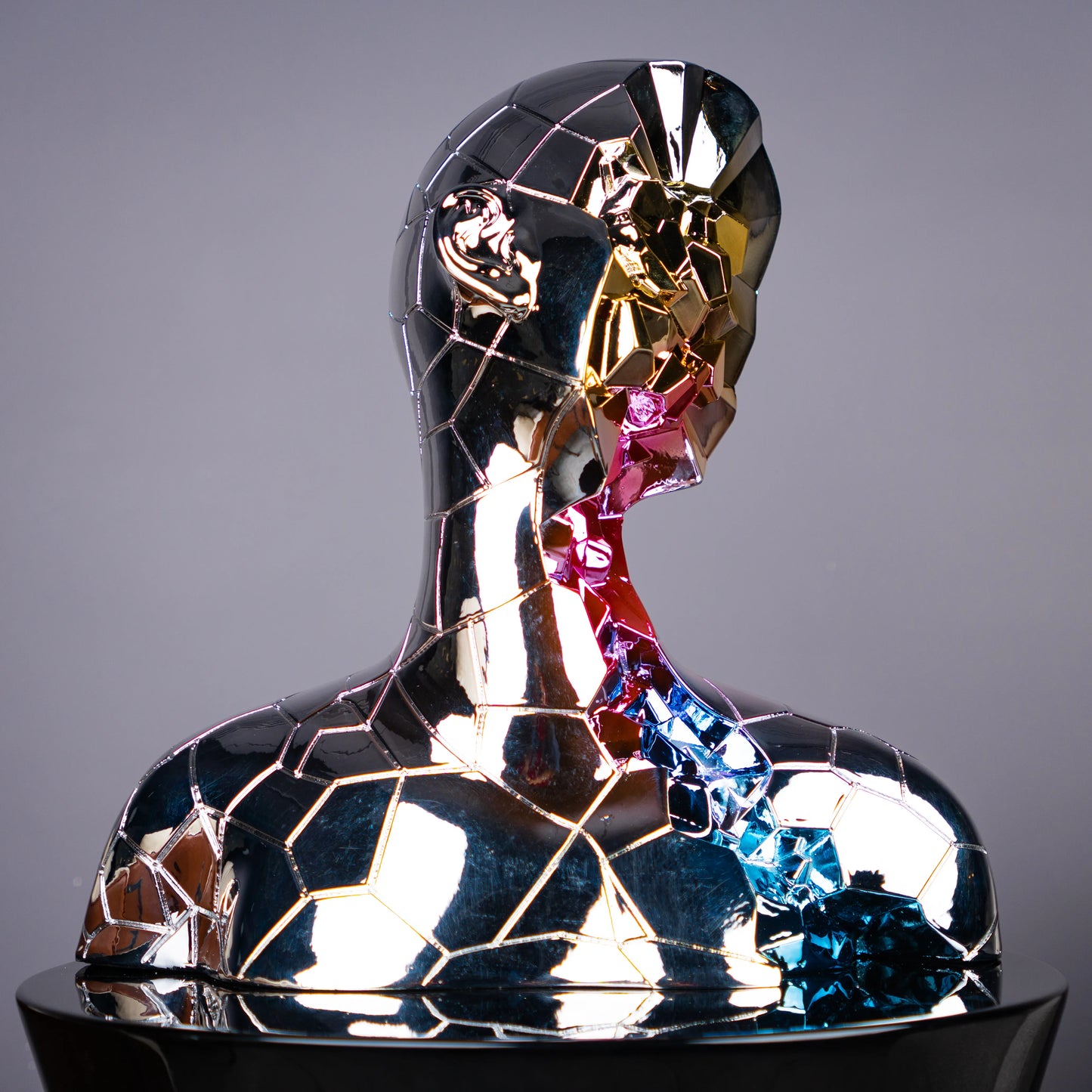 chrome silver abstract human bust with multicolor mosaic accents