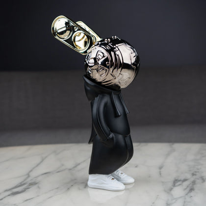 pop art character decor figure with chrome head and black body tabletop accent
