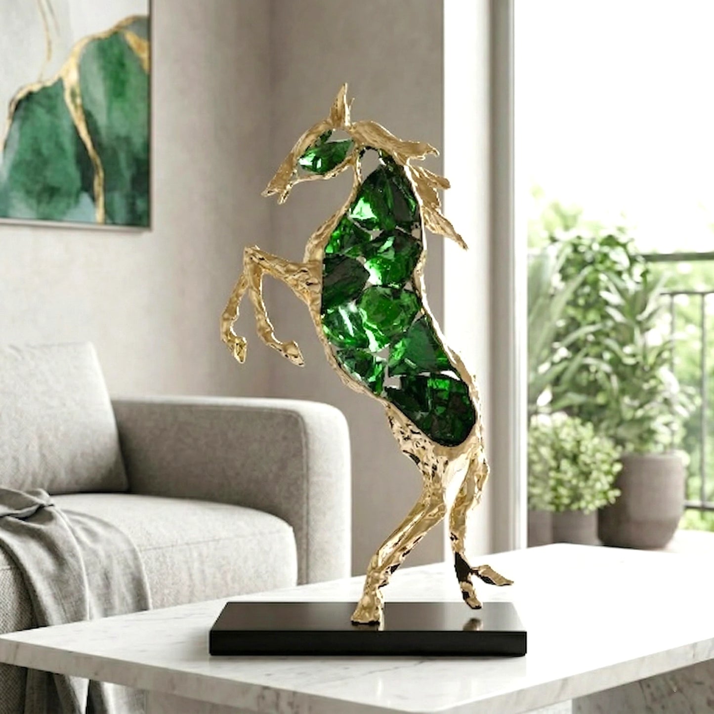 Emerald crystal horse sculpture with gold finish in dynamic galloping form