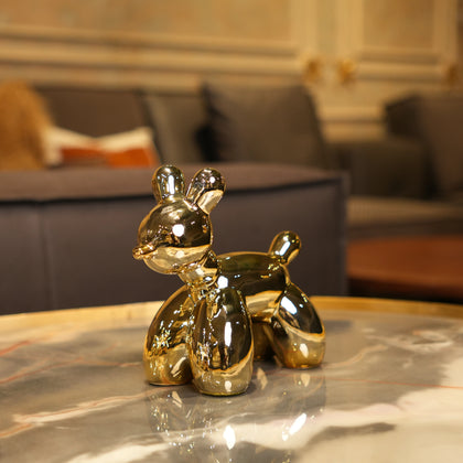 gold dog figurine set with modern poodle sculptures for luxury home decor styling
