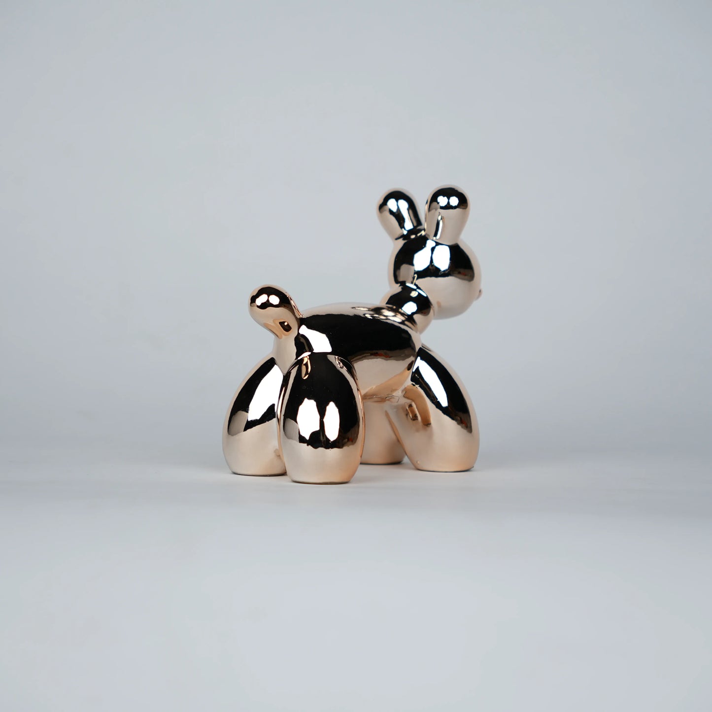 reflective rose gold poodle decor statues