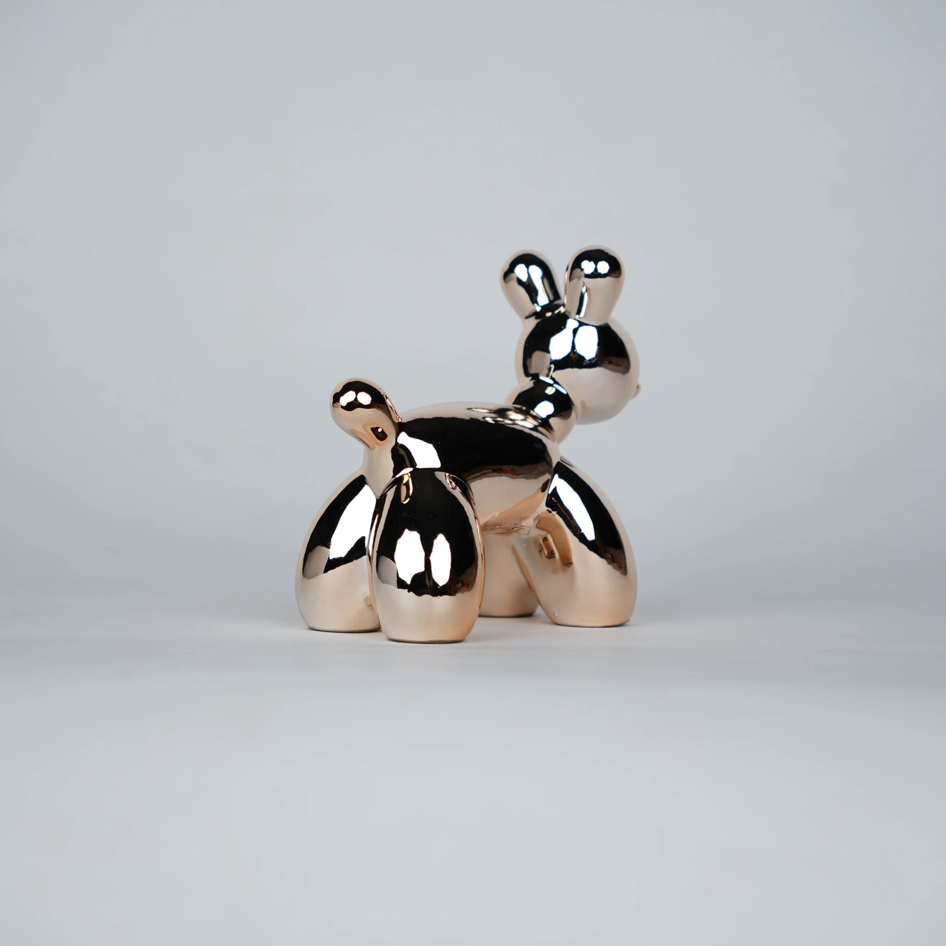 reflective rose gold poodle decor statues