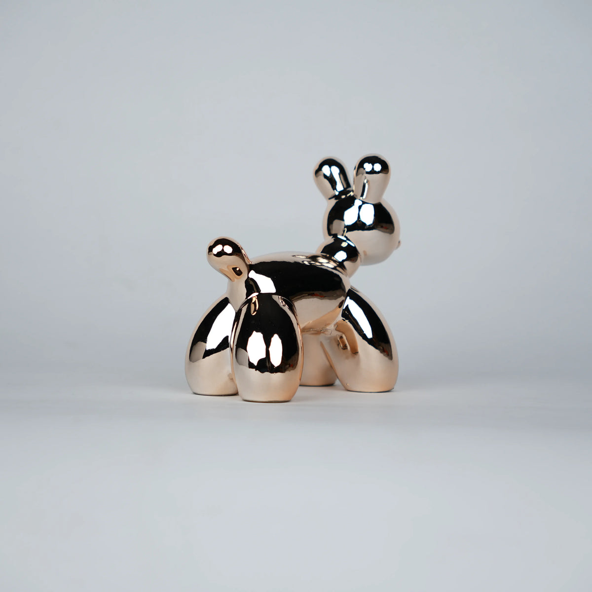 decorative dog figurine set with rose gold poodle decor for modern interiors