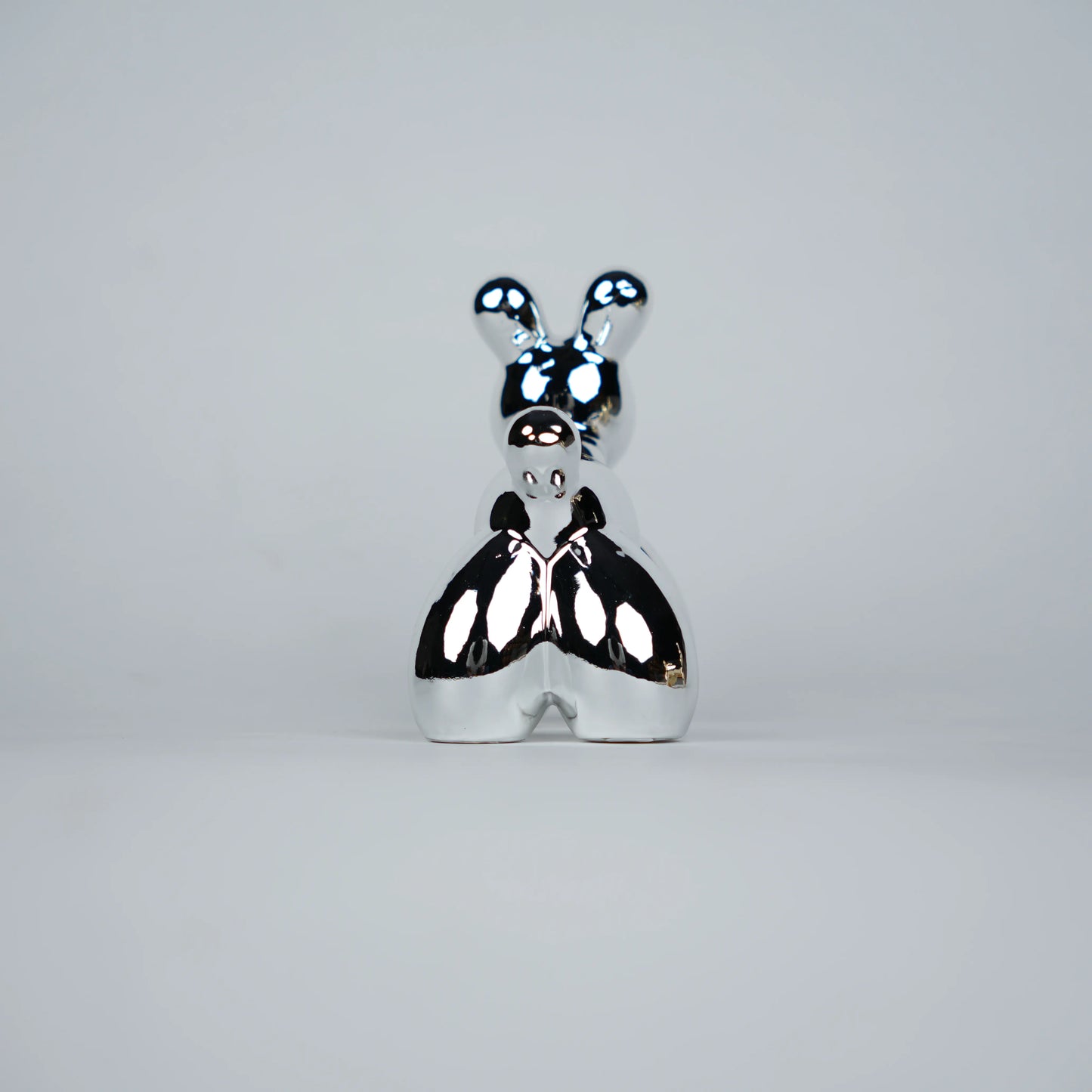 silver chrome decor poodle statues